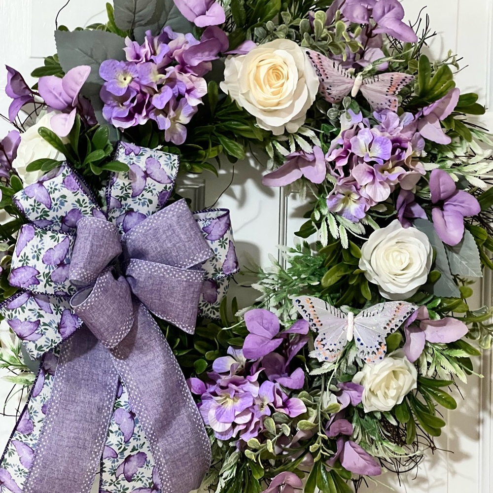 Purple and White Floral Wall Wreath with Lush Greenery